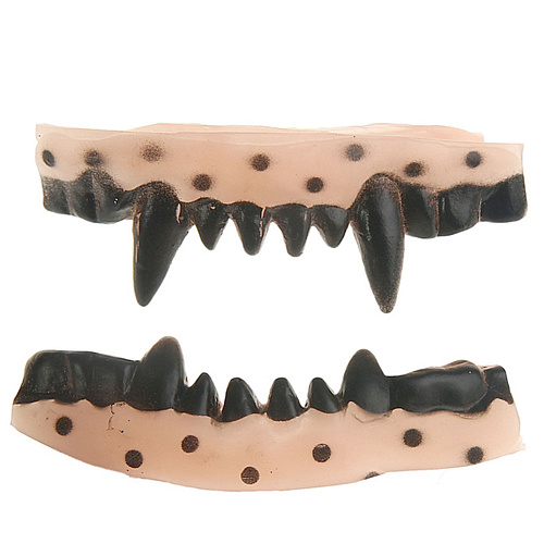 Зубы чудовища с клыками